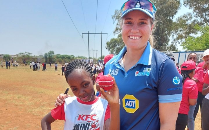 Star of the match Kedibone Setjie, in action, and below with her autographed prize of cricket ball presented by Titans Cricket Player Nicolien Janse Van Rensburg.